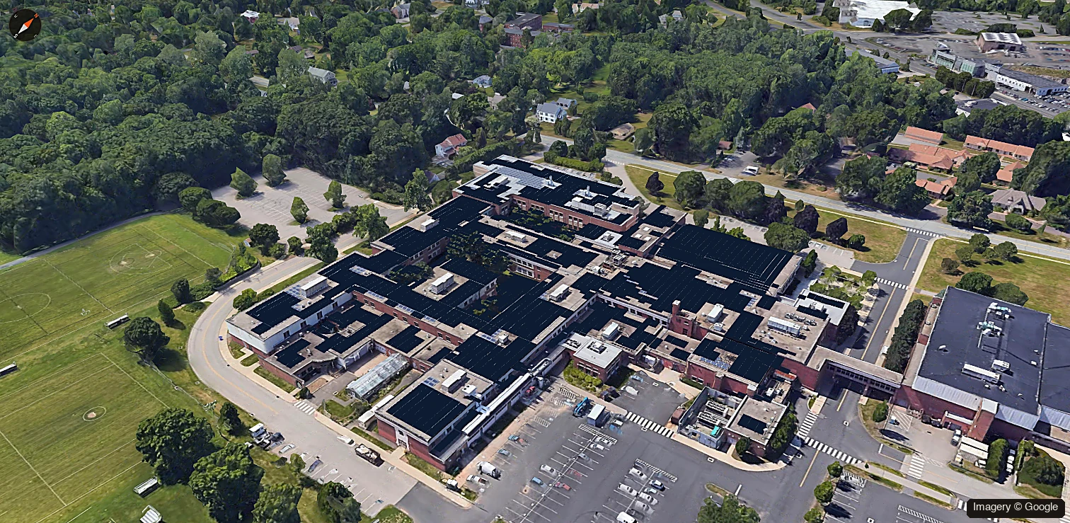 NOI Tech solar panel layout on a school roof in Google 3D imagery